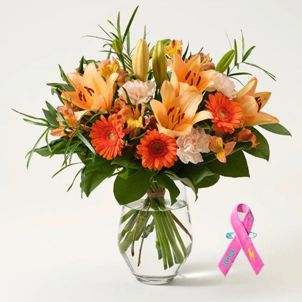 Vacker bukett med höstliga blommor +ett rosa band. Beställ hos Interflora!